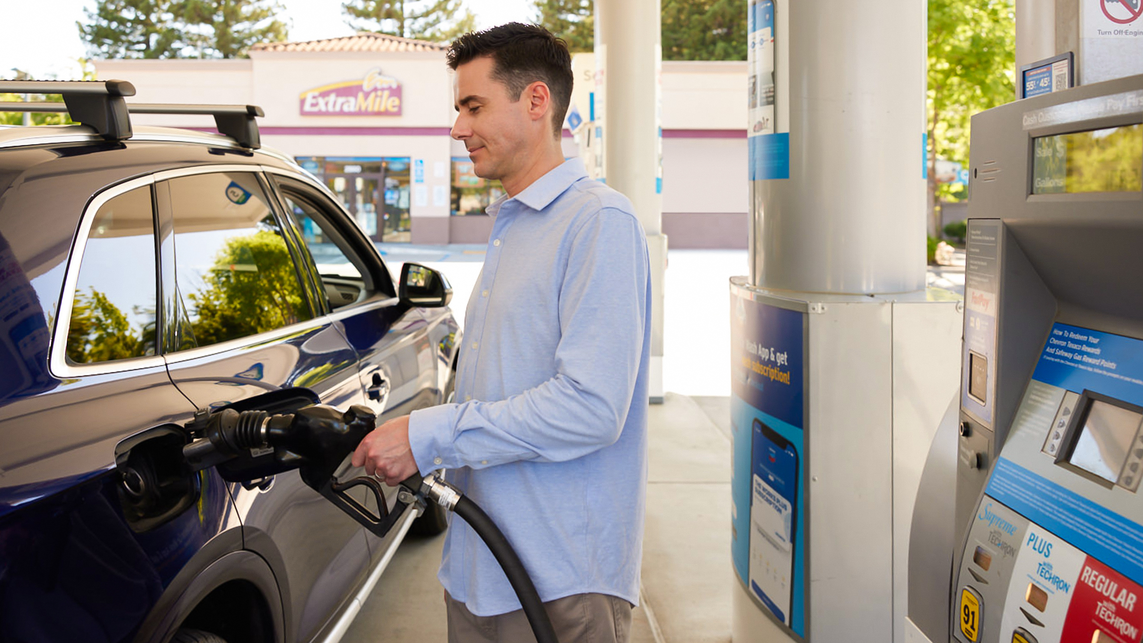 Man pumping gas